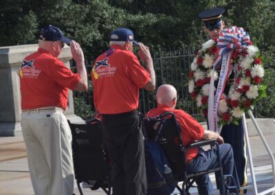 Veterans laying a wreath at the Tomb of the Unknown Soldier